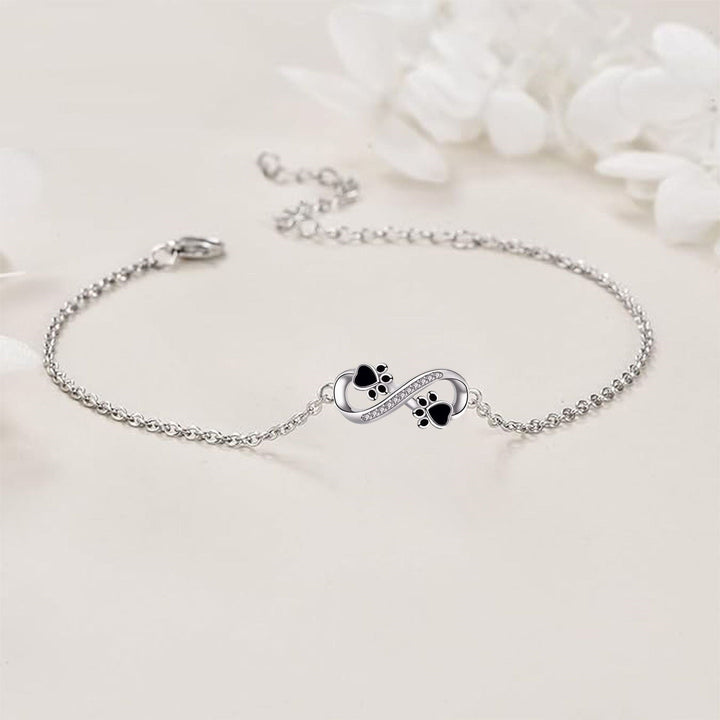 Armband mit Unendlichkeitssymbol, Anhänger mit Pfotenabdruck und Zirkonia
