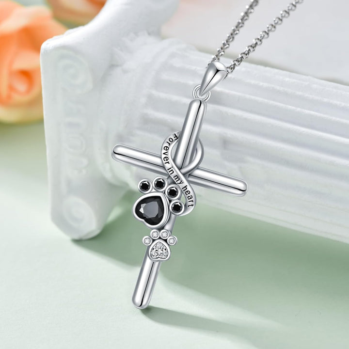 Halskette mit Anhänger in Form von Pfote und Kreuz aus Silber