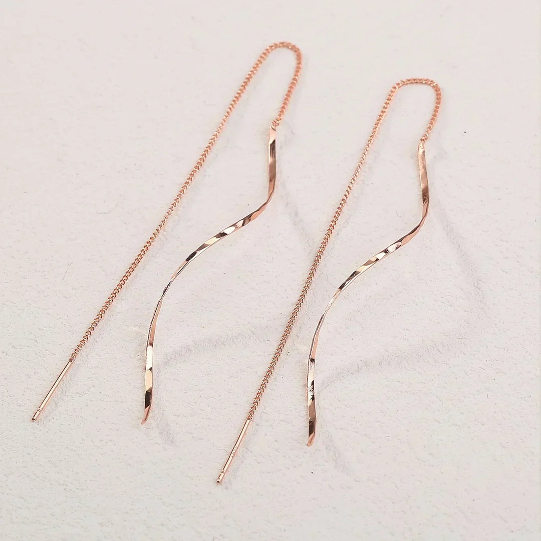 Lange Ohrringe mit Wellen-Design