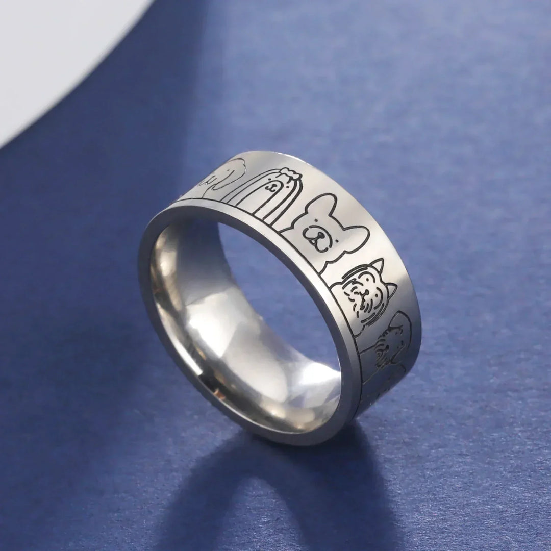 Breiter Ring aus Edelstahl mit Hundenmotiven