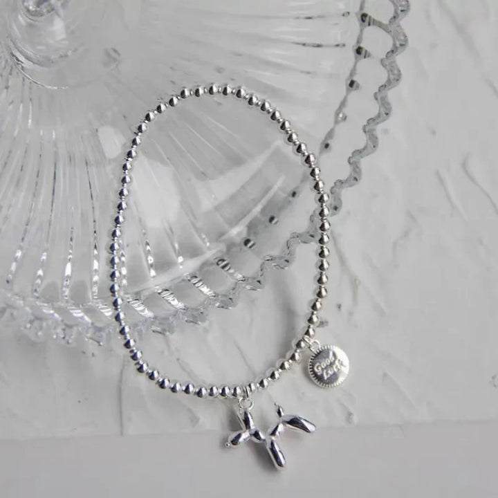 runder Armband mit Ballonhund